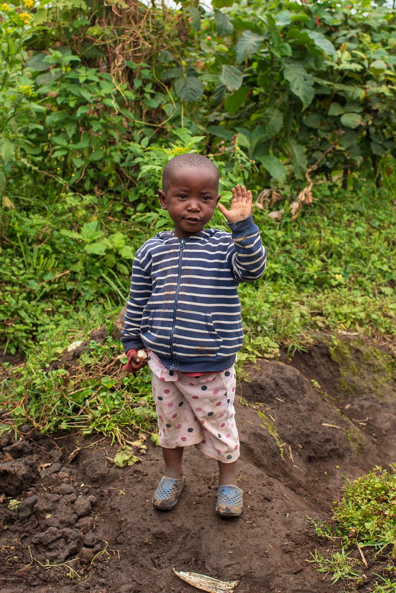 Child in Volcanoes National Park